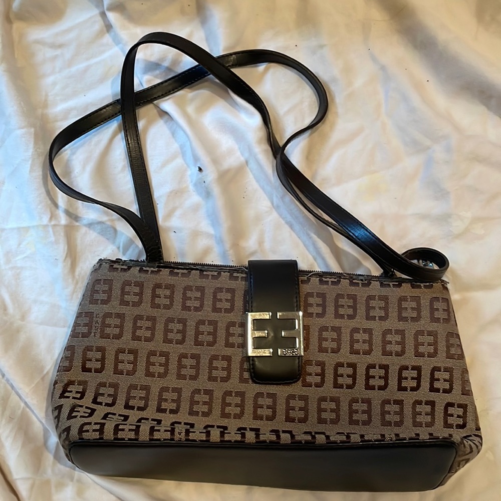 Ease brand handbag, tan in color.